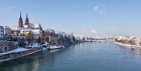 Snow-covered city view of Basel on the Rhine.